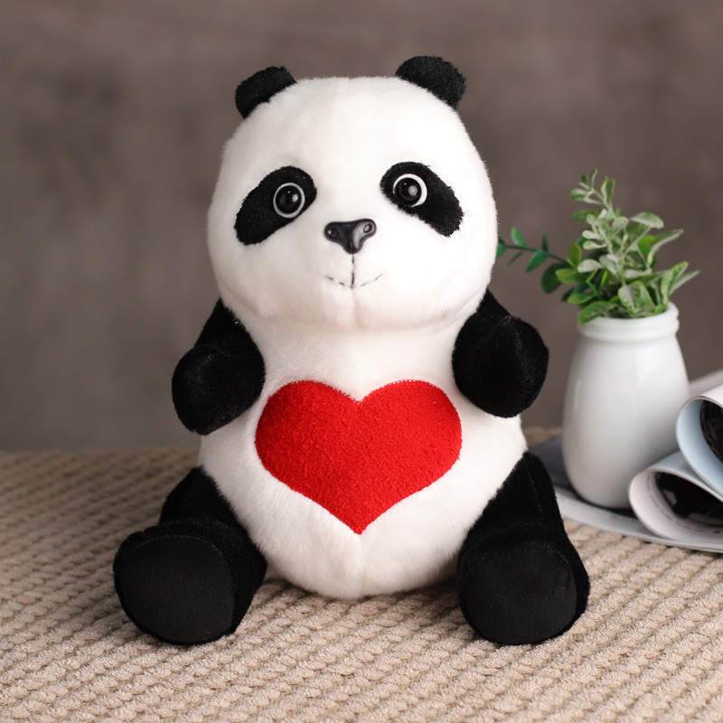 Panda en peluche avec coeur